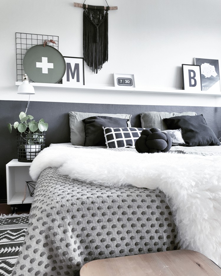 slaapkamer met zwart en grijstinten